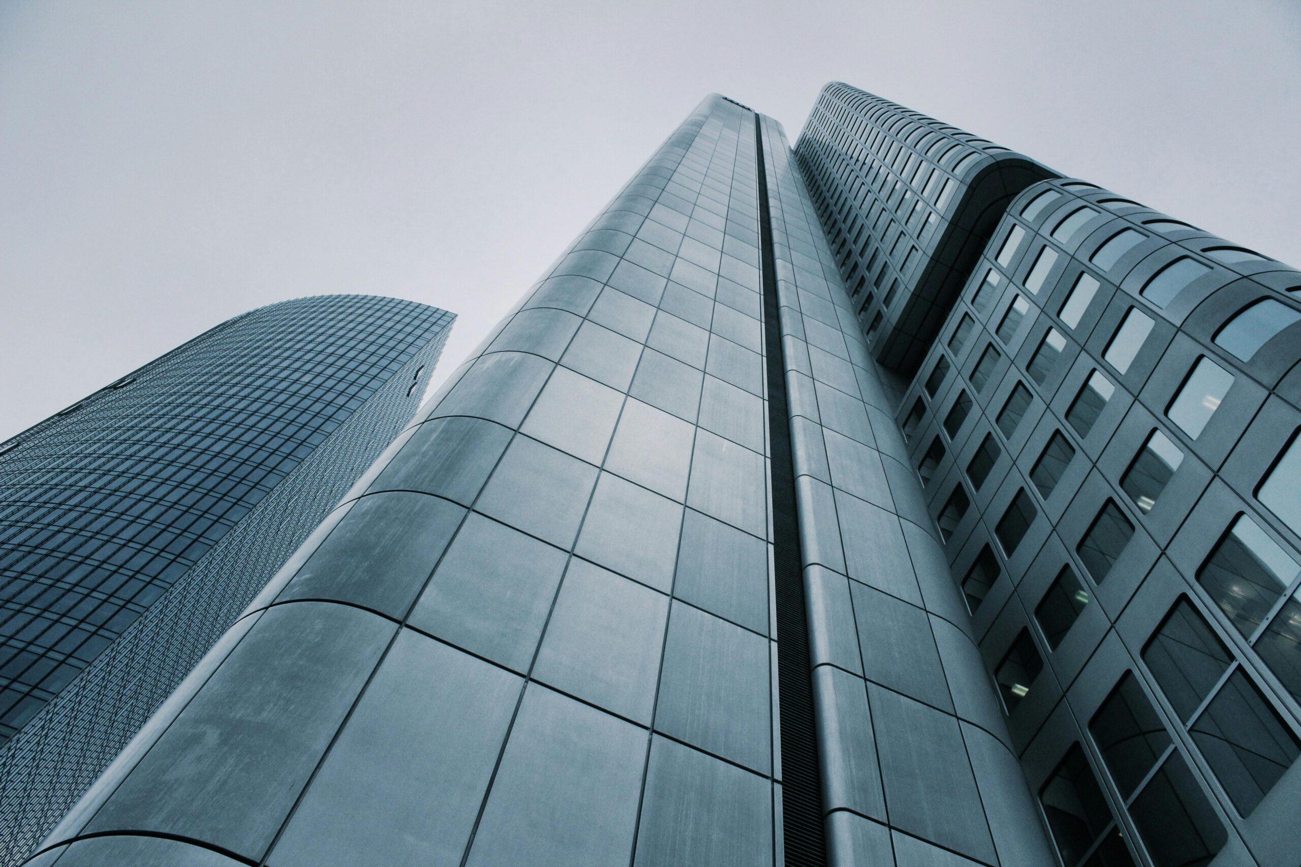 Modern skyscraper facade symbolizing the integration of digital human technology for advanced building services, including digital lobby assistants for smarter access, security, and visitor management.