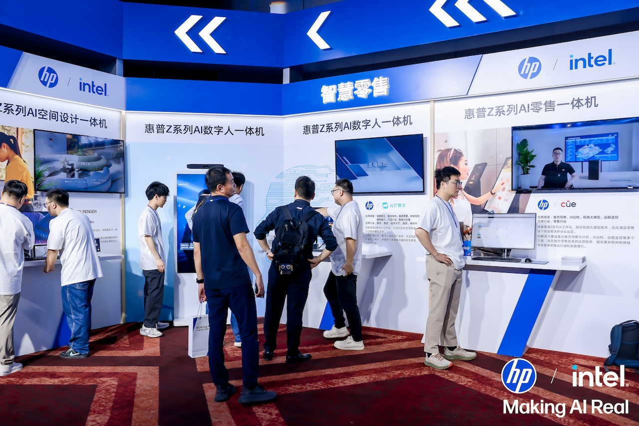 Attendees interacting with winmore digital ai digital human solutions at the hp and intel smart retail exhibition booth